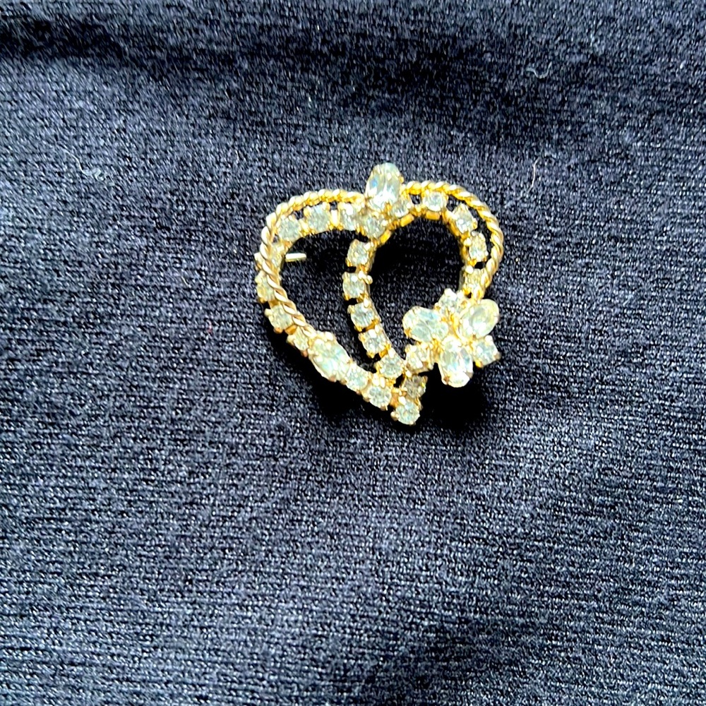 Vintage rhinestone brooch dress up any outfit